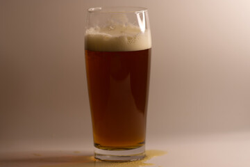 Glass of beer with foam