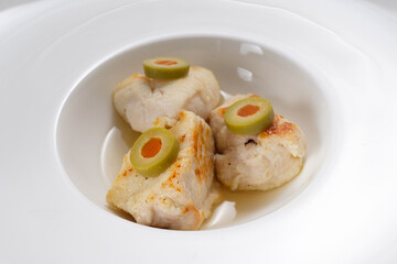 Chicken meat with green olives