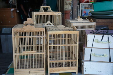wooden bird cage on display at the bird shop