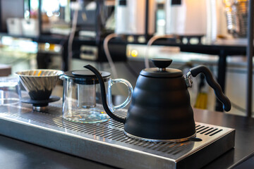 Black steel kettle for dip coffee in Coffee shop