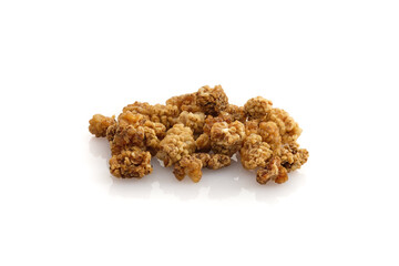 Dried red mulberry fruits on white