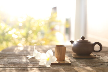 Wooden tea cup and tea pot