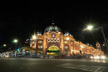 Exterior view of Flinders Street Railway Station at night in Melbourne, Victoria, Australia.