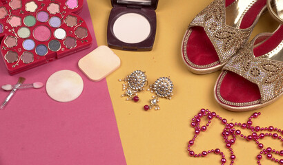 Bridal wedding jewelry and shoes, make up accessories on beautiful background. Top view, Space for text.