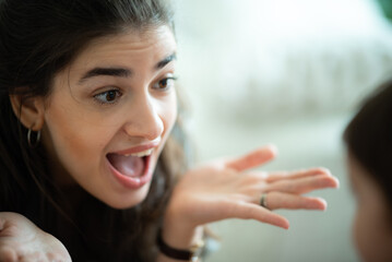 young mother and child baby are happy at home, childhood family concept with caucasian mom and little boy, newborn care lifestyle