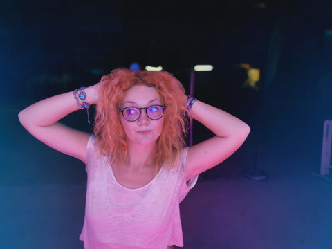 Portrait of redhead woman wearing eyeglasses