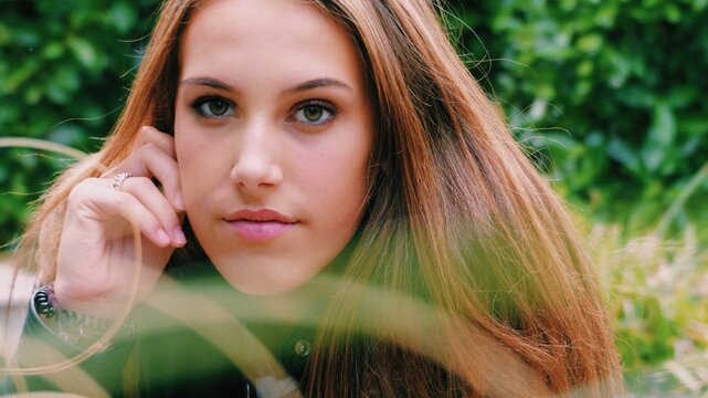 Woman With Brown Hair And Green Eyes