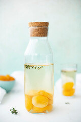 compote of dried apricots with honey in a glass bottle