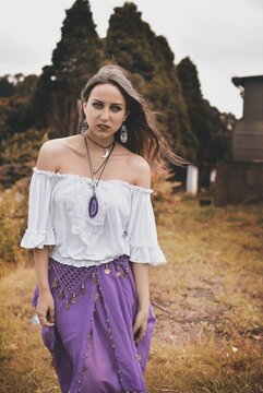 Young woman with blue eyes standing outdoor