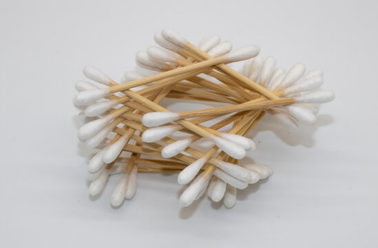 Flatly white cotton buds for ears isolated on a gray background Concept medicine,
