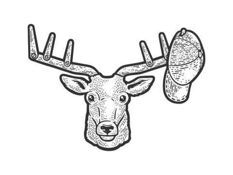 Hat on deer head with horns clothes hanger sketch engraving raster illustration. T-shirt apparel print design. Scratch board imitation. Black and white hand drawn image.