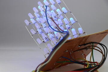 LED cube light project built using many blue light-emitting diodes and other simple electronic...