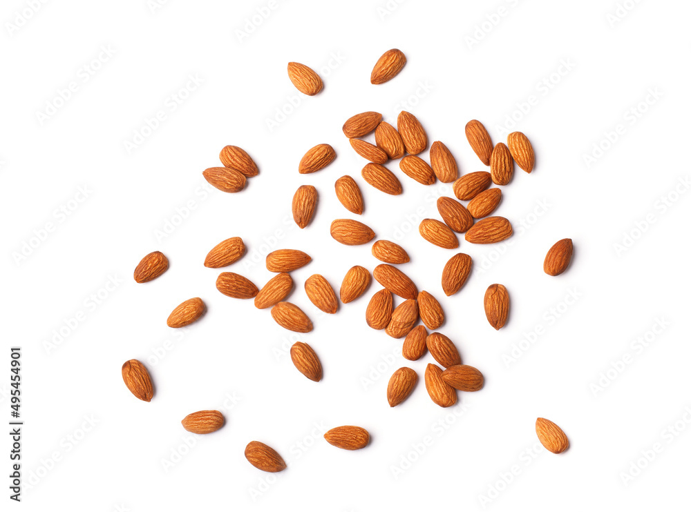 Wall mural scattered brown almonds isolated on white background. close-up view of raw organic nuts. healthy foo - Wall murals