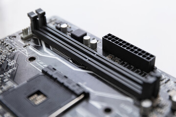 close-up of connecting RAM on a computer motherboard