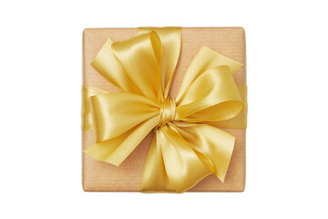 Gift box wrapped in craft paper with golden satin bow isolated on white background
