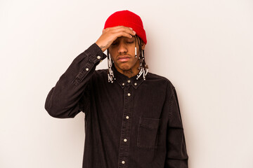 Fototapeta premium Young African American man isolated on white background touching temples and having headache.