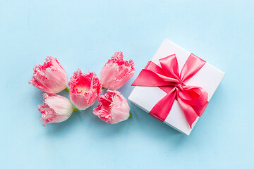 Fift box with pink ribbon. Women mothers day concept
