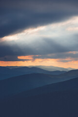 the light in the mountains breaks through the clouds Ukraine Carpathians