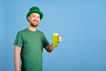 St. Patrick's day. Sexy guy with a beer.