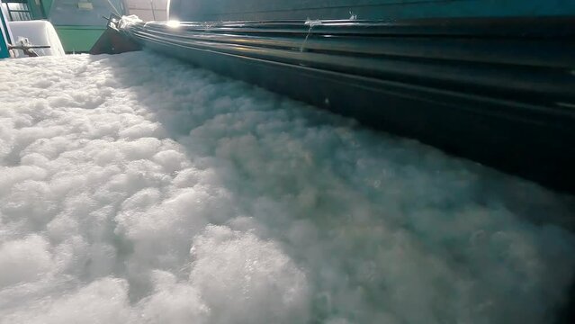 Holofiber production. Holofiber. Production of non-woven materials. Holofiber at a nonwovens factory.