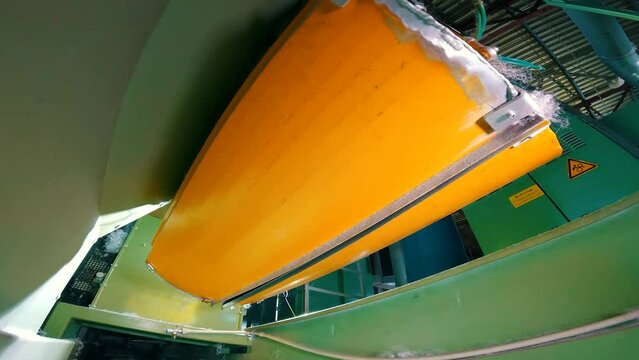 Holofiber. Holofiber production. Holofiber at a nonwovens factory. Production of non-woven materials