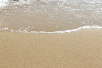 sea ​​foam on the beach