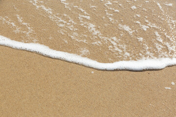 sea ​​foam on the beach