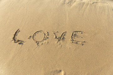 it says love on the beach