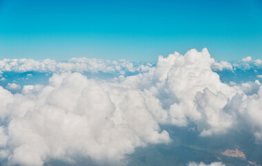 Above clouds from airplane window