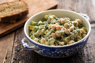 Creamy chickpea salad with avocado, dill, onion and mustard sauce