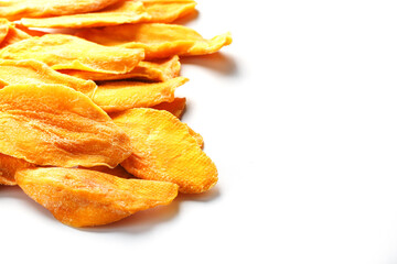 Dried mango sliced on a white background with free space