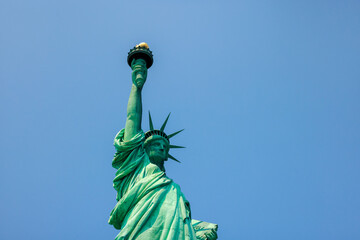 Left side view of the Statue of Liberty in New York City.