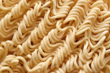 Uncooked instant noodles texture background. 