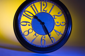 Wall clock backlit marking 10:25