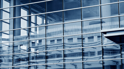 Fototapeta na wymiar Windows of modern office building