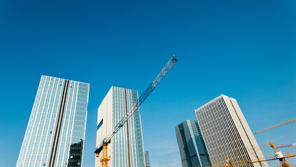 Naklejka premium Modern office tower building under construction