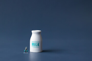 Healthy dairy milk with producer.