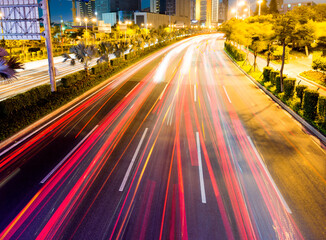 Cars light trails on highway at night