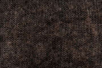 Brown lambswool fabric. Wool material. felt texture
