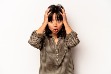 Young hispanic woman isolated on white background surprised and shocked.