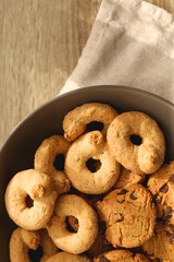 Plate of sugar cookies and chocolate chip cookies on the table. Flat lay.