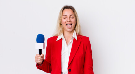 blonde pretty woman with cheerful and rebellious attitude, joking and sticking tongue out....