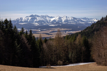 Pieniny National Park in Carpathian Mountains, Poland - 03.27.2022 - Sunny day with nice view on Tatra Mountains. - obrazy, fototapety, plakaty