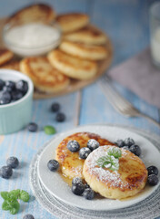 Cottage cheese pancakes - traditional Russian syrniki	