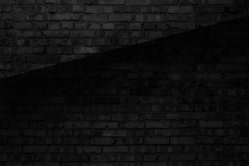 Black brick wall. Dark textured wallpaper