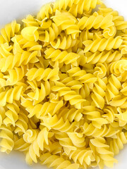 Food background. Dry pasta. Pasta close-up, top view. Food concept. Texture.