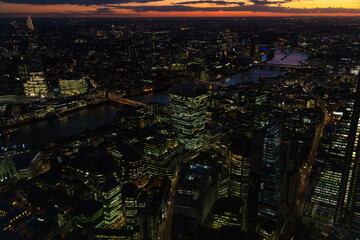 Aerial London illuminated night view financial business center