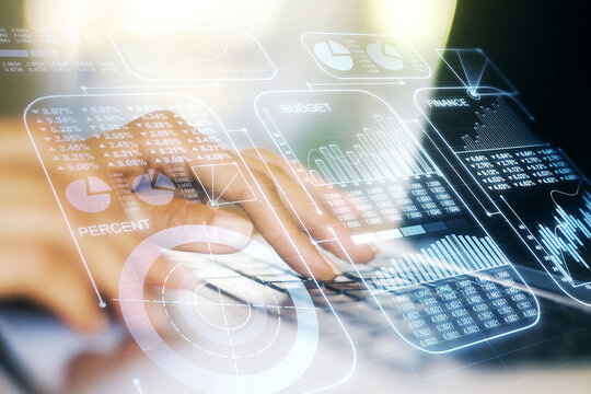 Abstract creative analytics data spreadsheet with hands typing on laptop on background, analytics and analysis concept. Multiexposure