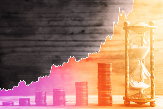 Hourglass, euro coins and rising sparkline chart. Concept of time value of money and investment.