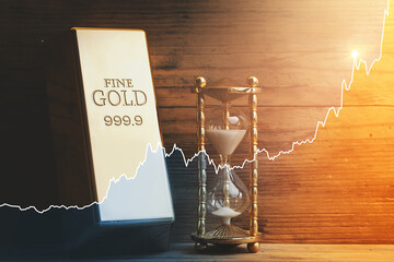 Hourglass, gold bar and rising chart. Time for investment. Gold price rising during the time.